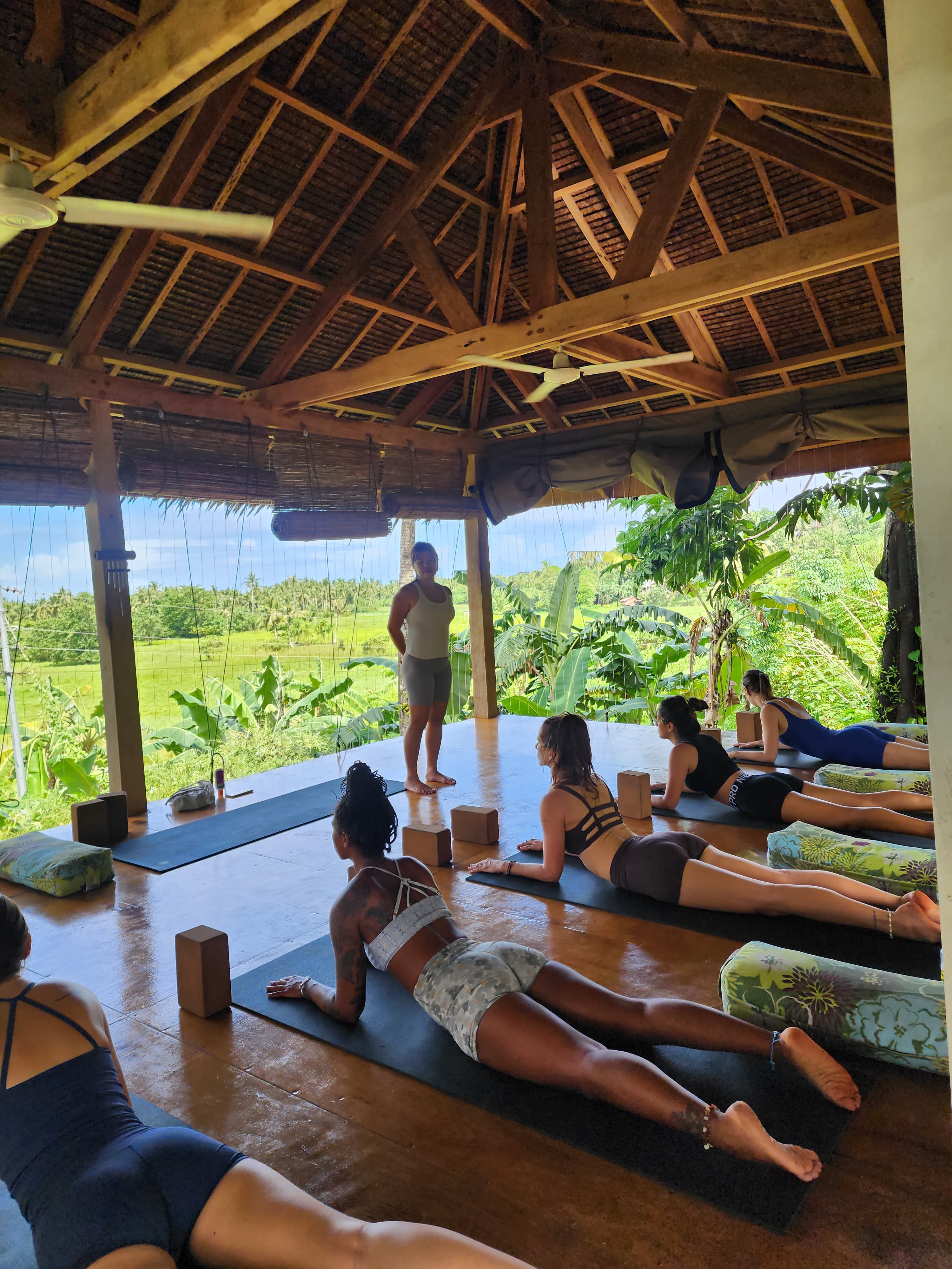 Jannah Abueza, Upekkha Yoga School teacher, welcoming students online